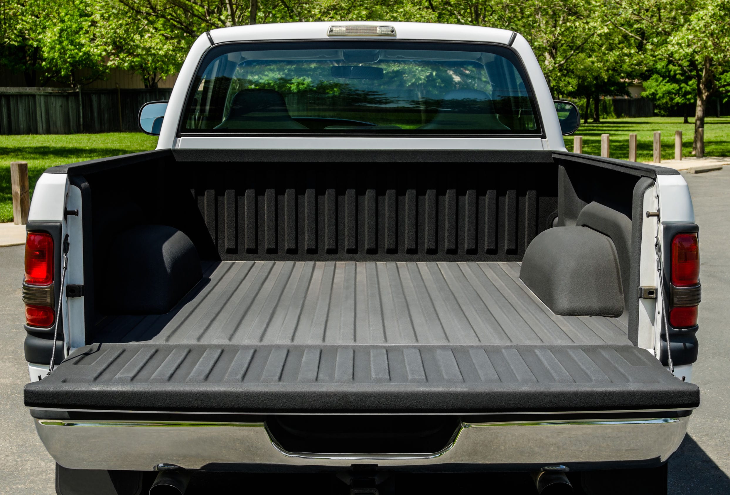 White Truck Bed, empty bad of an modern white truck, daylight